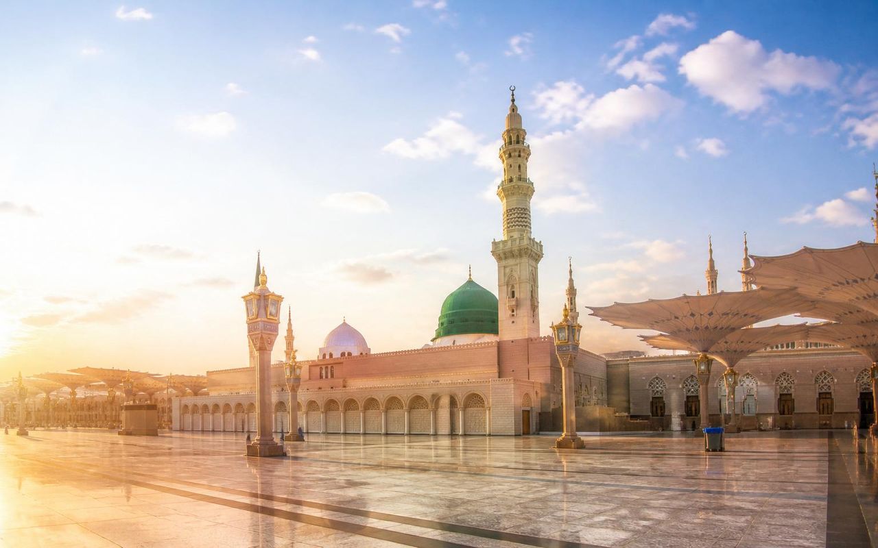 WaafiPay Final E2E Test - $1 — Al Masjid An Nabawi in Madinah with the Green Dome at sunrise